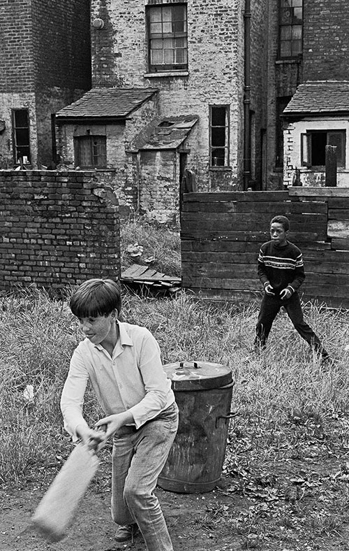 Playing cricket on a patch of wasteland Manchester  (1969)