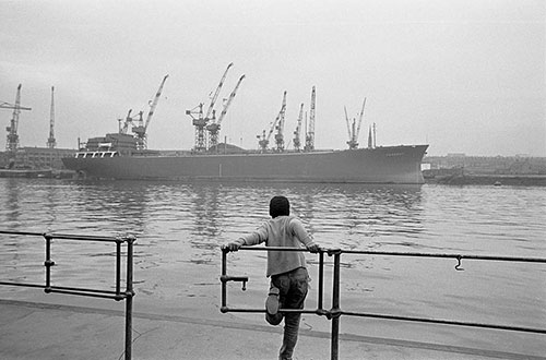 Boy dreaming by the docks Tyneside  (1971)