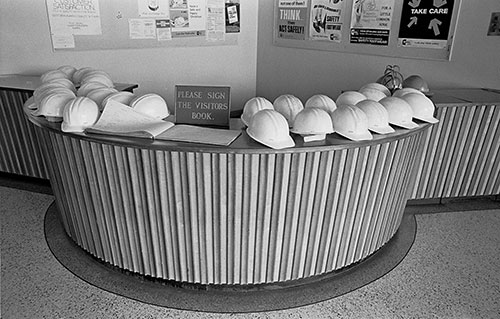 Safety helmets lined up, British Steel Bilston  (1976)