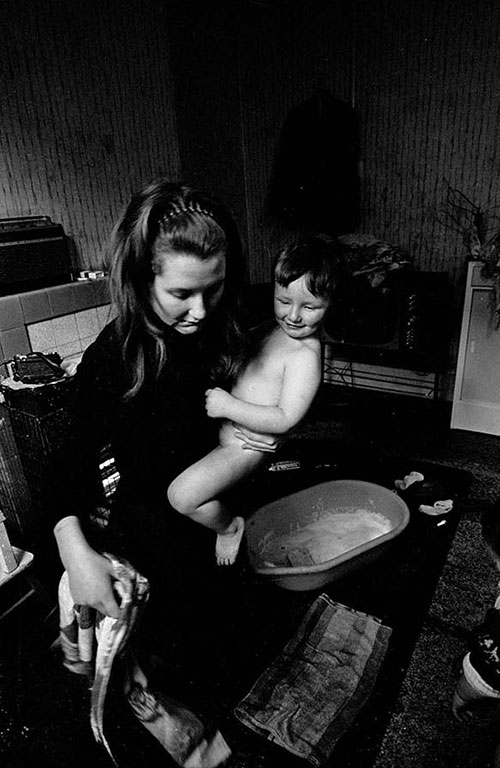 Greta giving her little boy a bath,  Ladywood Birmingham  (1968)