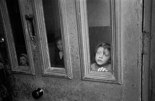 Child at doorway of a Liverpool multi let,  (1969)