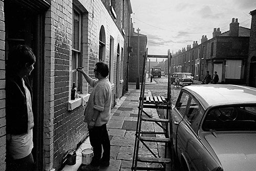 Repainting their house Salford  (1969)