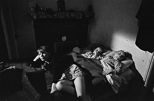 Pauline R and her sisters sleeping in the living room, Whitechapel, London,  (1969)