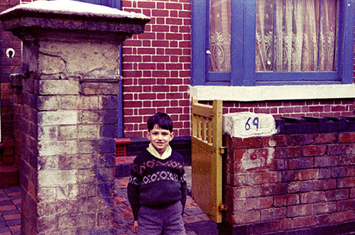 Boy and house exterior Handsworth  (1966)