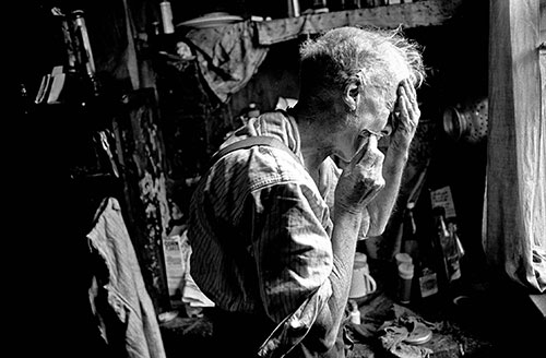 Elderly nearly blind man shaving, Aston, Birmingham  (1968)