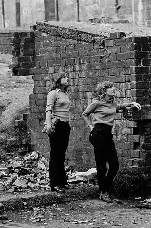 Teenage girls in a Maryhill tenement courtyard Glasgow  (1971)
