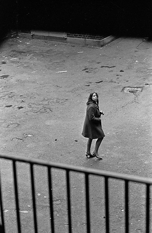 Crossing the courtyard of a homeless hostel, Southwark London  (1971)