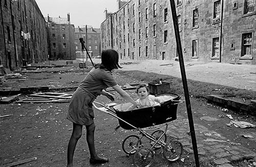 Mother and her baby boy in a Gorbals tenement yard  (1970)