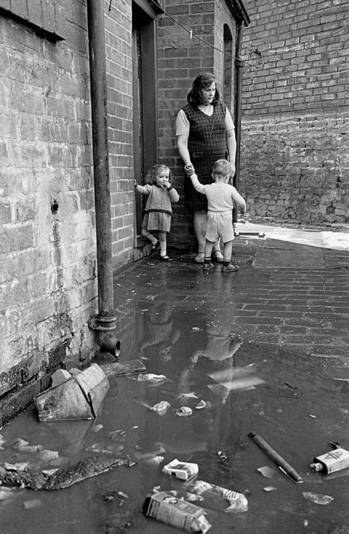 Family living with foul drainage, Winson Green, Birmingham  (1971)