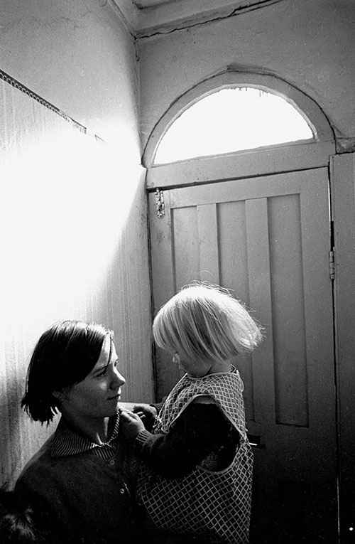 Mother and daughter living in slum housing, Birmingham  (1968)