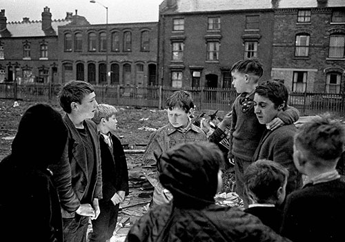 Group by a Guy Fawkes bonfire, wasteland,   Hockley Birmingham  (1967)