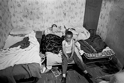 Child in his overcrowded bedroom  (1971)