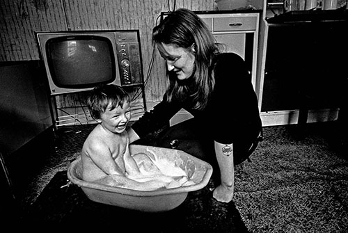 Greta giving her little boy a bath,  Ladywood Birmingham  (1968)