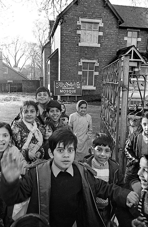 Children outside the temporary home of the Mosque Wolverhampton  (1976)