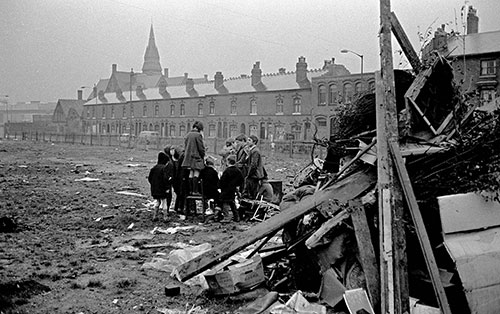 Group by a Guy Fawkes bonfire, wasteland Hockley Birmingham  (1967)