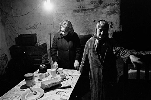 Mrs D and her daughter in their cellar flat Liverpool  (1969)