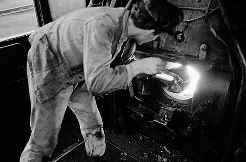 Fireman stoking the boiler, Oxley engine sheds Wolverhampton  (1967)