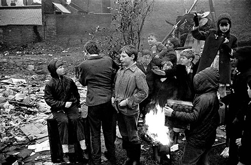 Group by a Guy Fawkes bonfire, wasteland Hockley Birmingham  (1967)