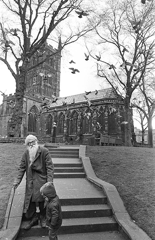 Sikh grandfather and grandson by St Peter's church Wolverhampton  (1976)