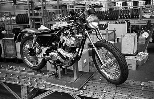 Unfinished motorcycles awaiting bodywork, Nortons