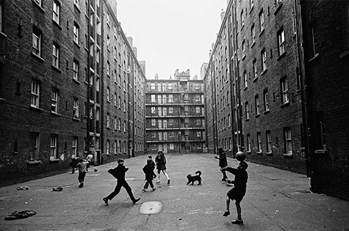 Children playing in a Whitechapel tenement courtyard  (1969)