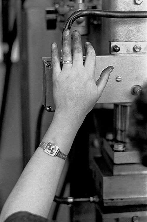 Woman's hand on a welding machine, Josiah Parkes lock factory, Willenhall  (1976)