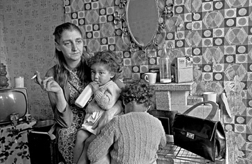 photograph of working class mother with two children